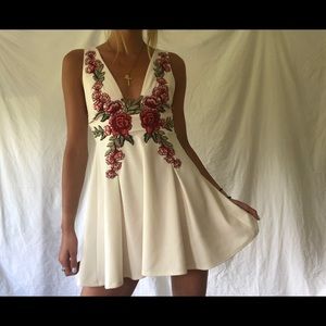 white dress with rose detailing